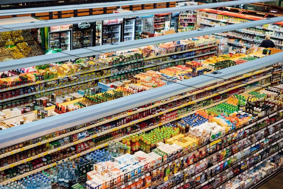 Supermarket shelves stocked with fast-moving consumer goods